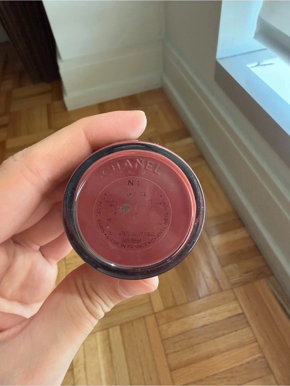 CHANEL Black Round Compact with Raised CC Emblem